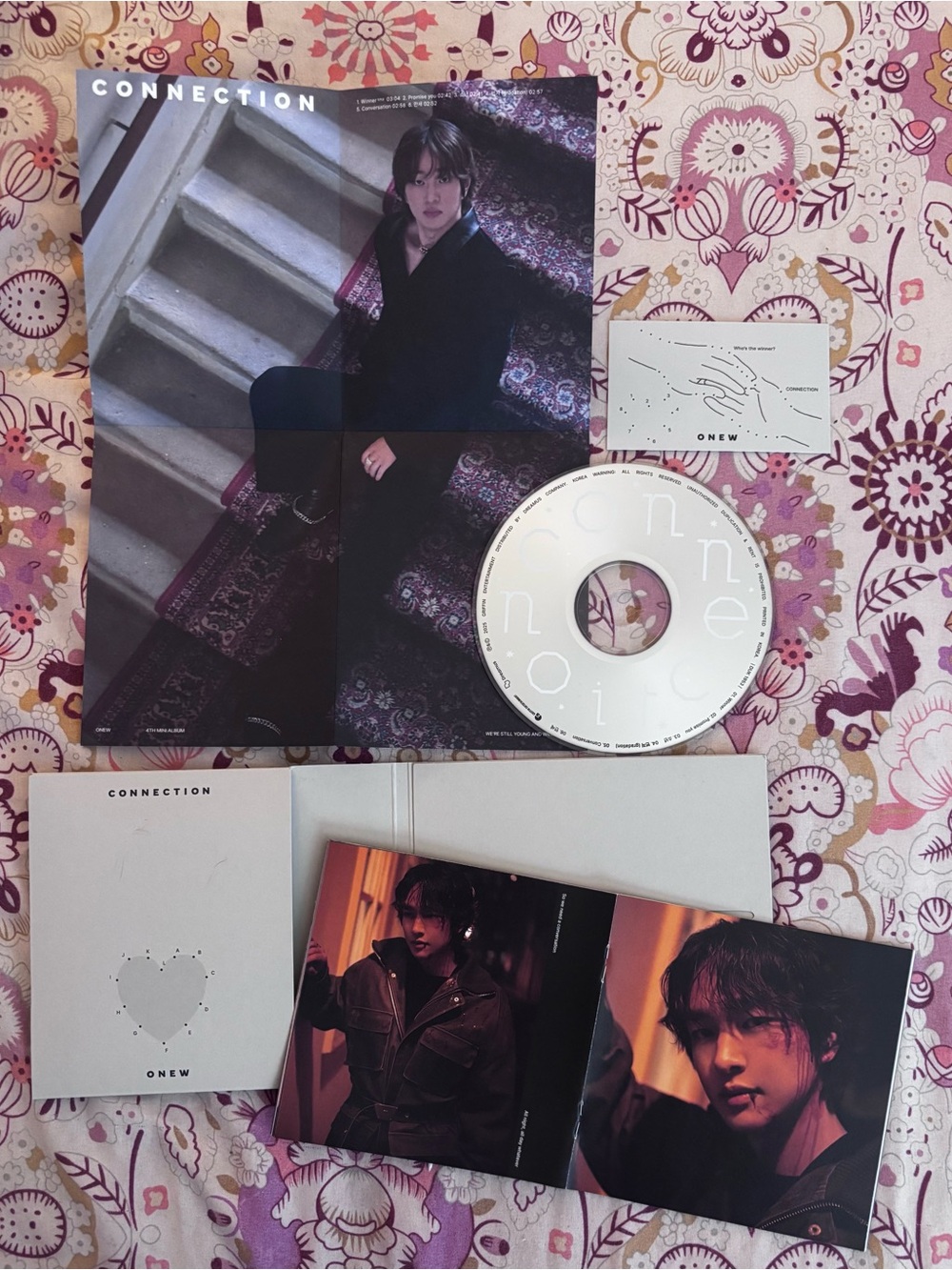 Onew's fourth mini-album Connection released a white digipack KPop